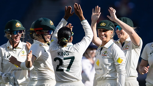 Alana King high fives teammates during the 2025 Ashes Test