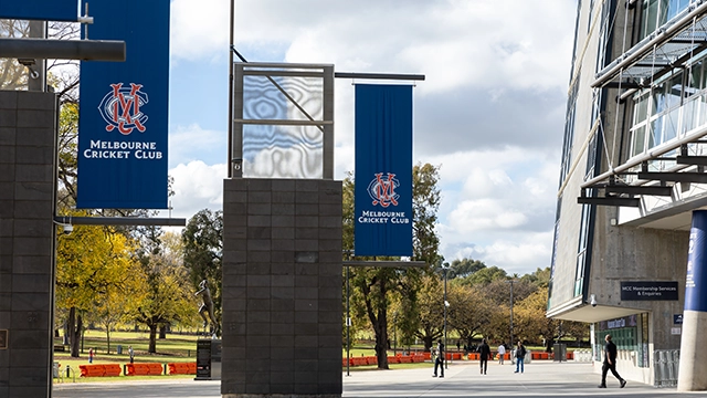 Melbourne Cricket Club flags outside Gate 2 of the MCG