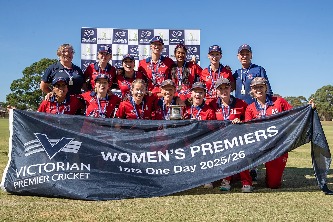 MCC Cricket Women's team photo with premiership cup and medals