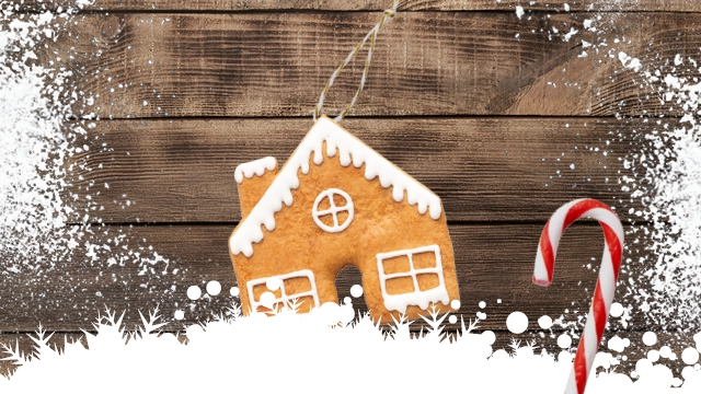 2025 MCC Christmas Cooking Masterclass function A gingerbread house on a wooden background