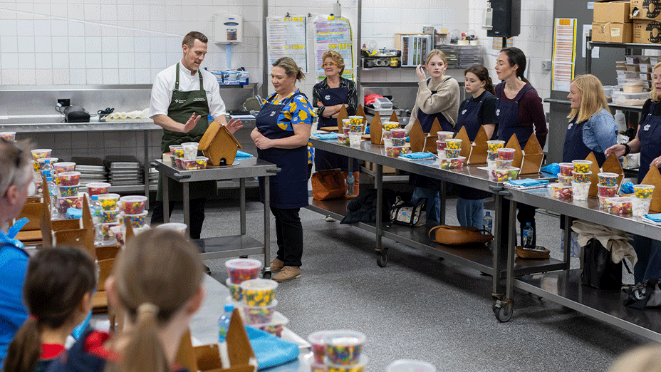 Chef leading a gingerbread masterclass in an industrial kitchen
